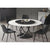 Round Dining Table with Special Designed Base and Beautiful Chairs in Dining Space