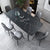Black Sintered Stone Dining With Four Legs Base that make Sitting Comfortable